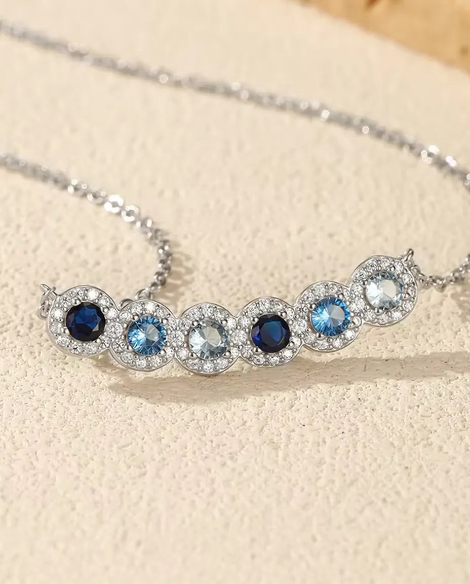 Blaue Stabkette - Sechs Steine im Blauverlauf mit Pavé Halo, 34 mm Bogen, 925 Sterlingsilber, 40+5 cm