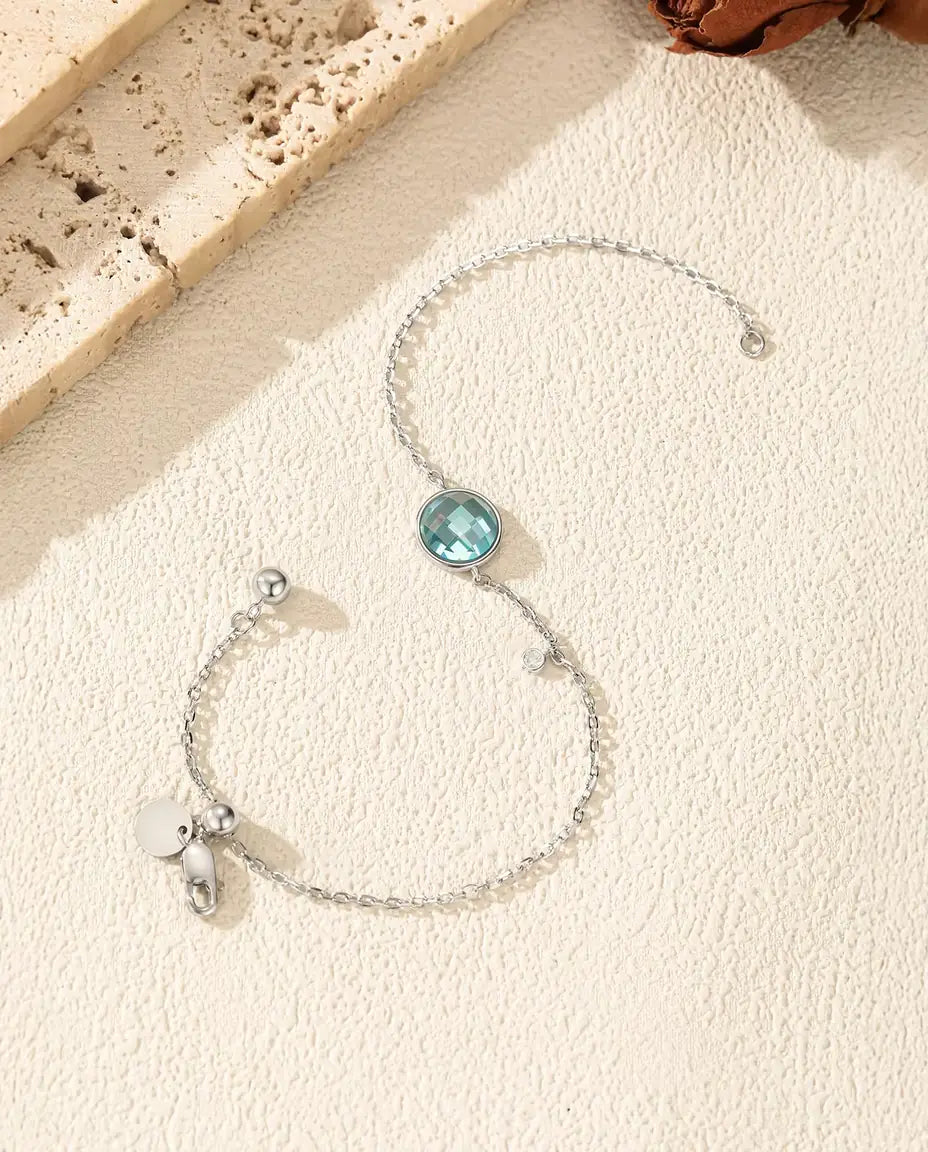 Armband mit blauem Zirkonia - 8 mm Schachbrettschliff an Ankerkette mit Schiebeverschluss, 925 Sterlingsilber
