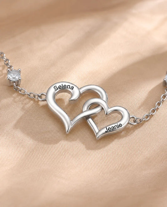 Personalisiertes Doppelherz Armband mit 2 Namen - ineinander verschlungene Herzen mit zwei Geburtssteinen