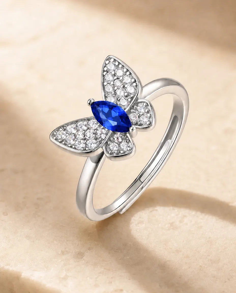 Saphir Ring – Schmetterlingsring mit Labor-Saphir im Marquise-Schliff, 925er Sterlingsilber, grössenverstellbar, Geschenk für Sie