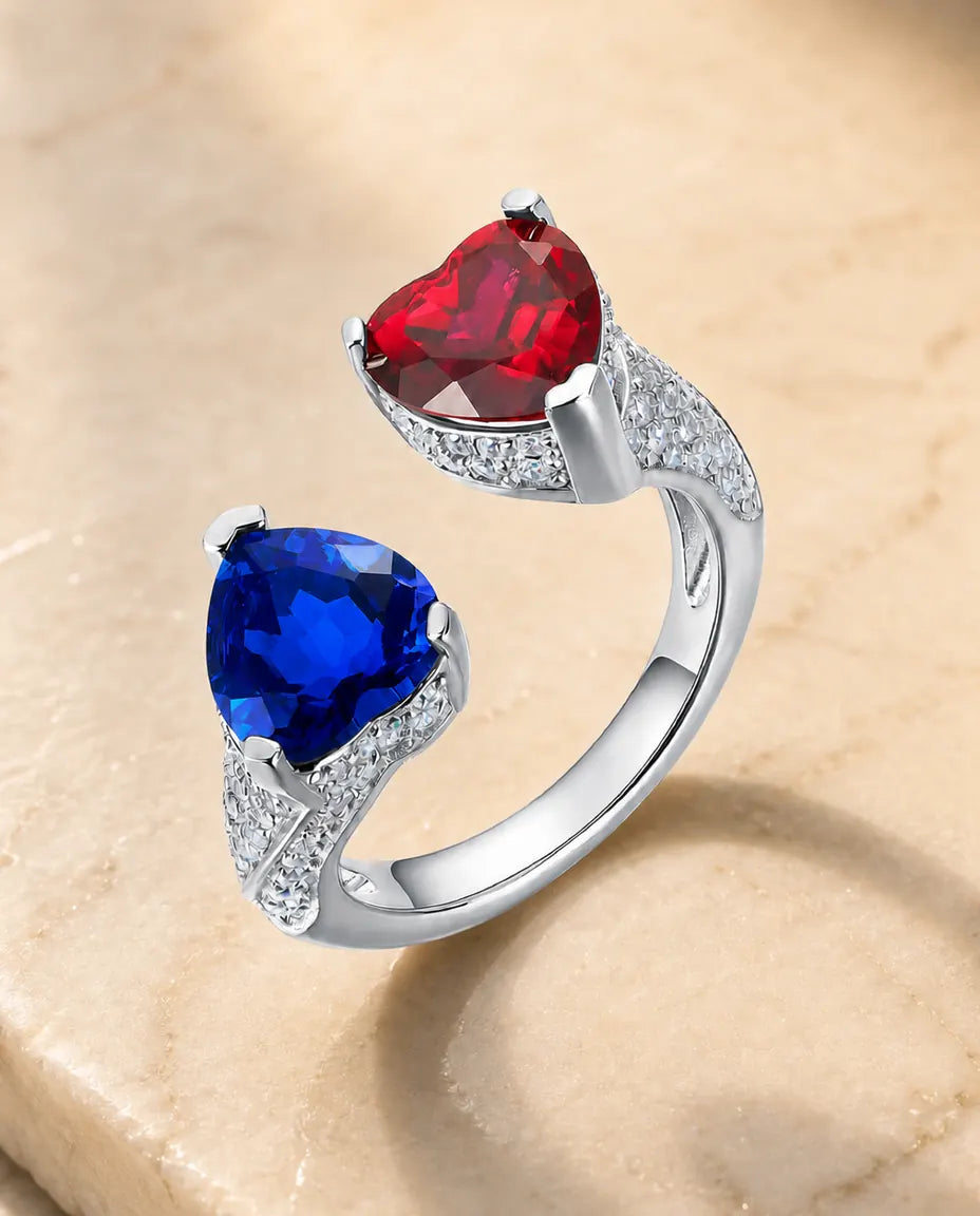 Saphir Ring – Toi-et-Moi mit zwei Herzen aus Labor-Saphir und Labor-Rubin, 925er Sterlingsilber, grössenverstellbar