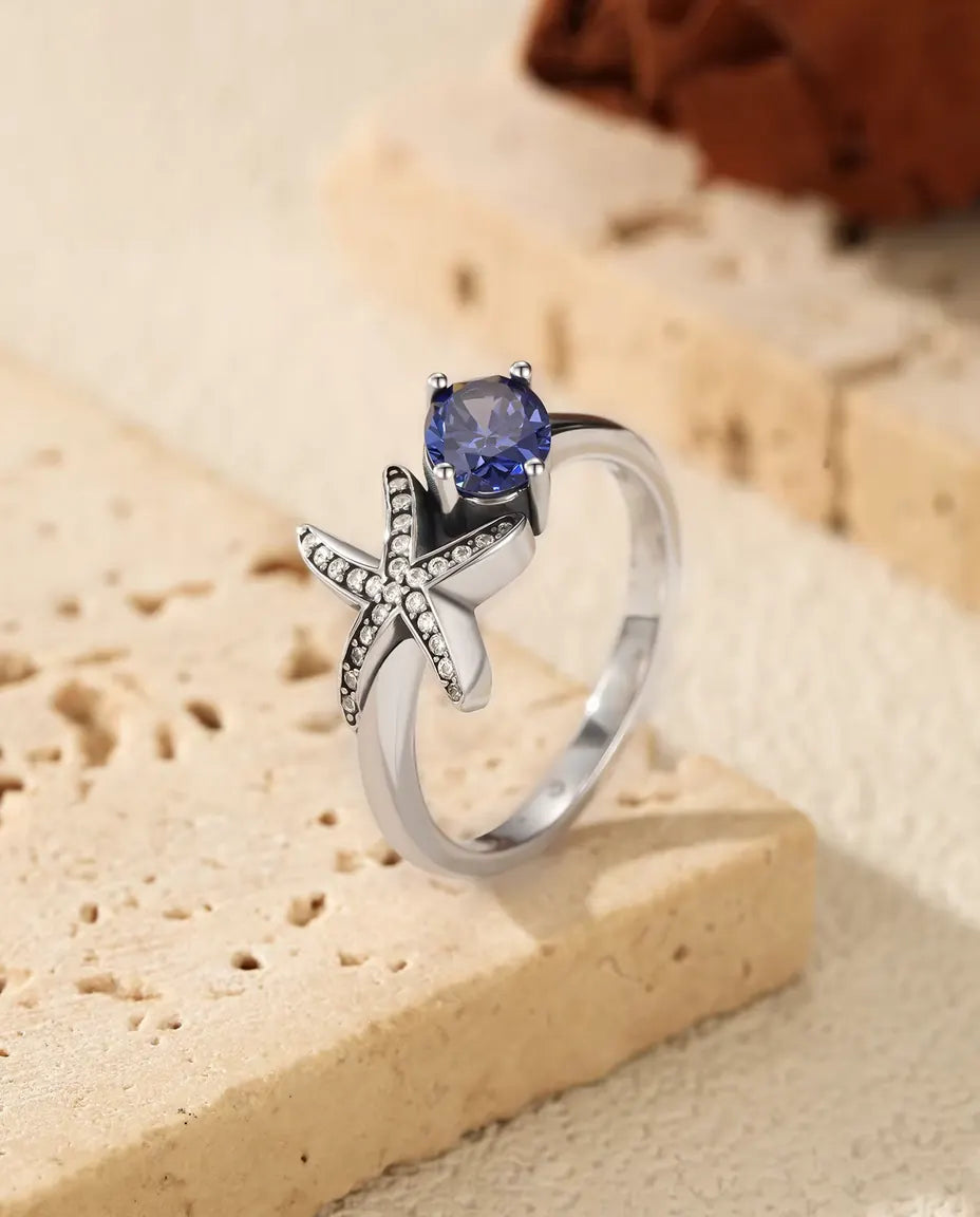 Seestern Ring - ovaler violetter Zirkonia 5 x 7 mm mit Pavé Stern, Grössen 5 bis 9, 925 Sterlingsilber