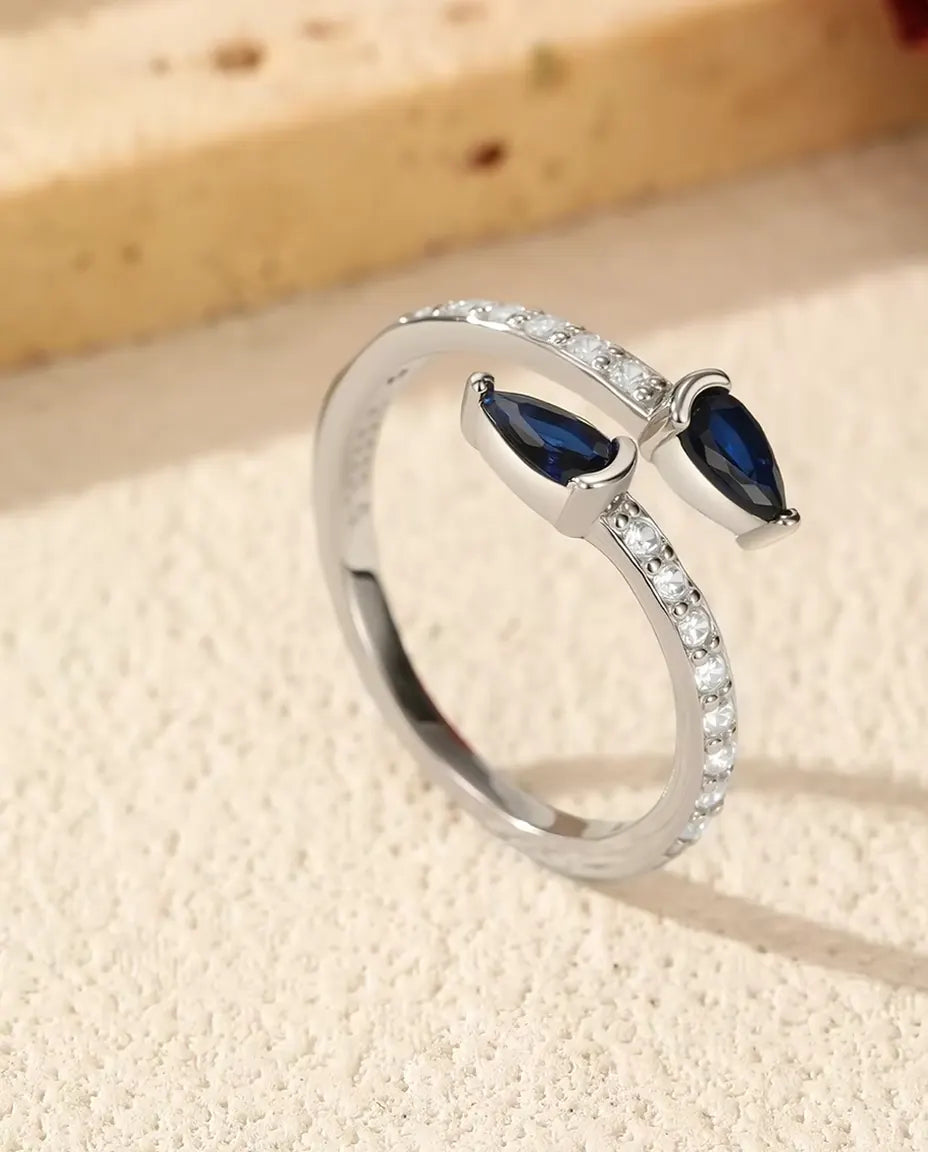 Blauer Tropfen Ring offen für Damen - Zwei Tropfensteine auf Pavé Schiene, 925 Sterlingsilber, verstellbar