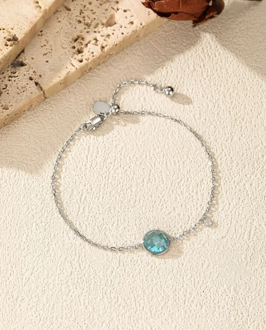 Armband mit blauem Zirkonia - 8 mm Schachbrettschliff an Ankerkette mit Schiebeverschluss, 925 Sterlingsilber