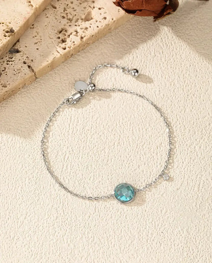 Armband mit blauem Zirkonia - 8 mm Schachbrettschliff an Ankerkette mit Schiebeverschluss, 925 Sterlingsilber