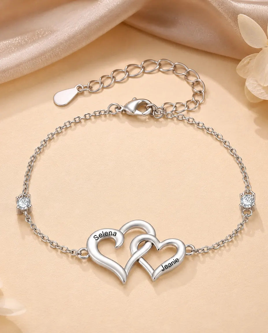 Personalisiertes Doppelherz Armband mit 2 Namen - ineinander verschlungene Herzen mit zwei Geburtssteinen