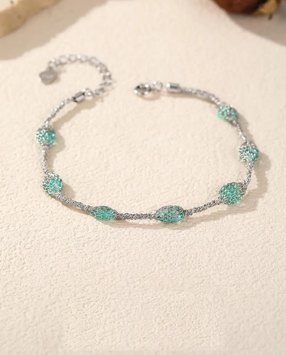 Zirkonia Armband aus 925 Sterlingsilber - flach auf heller Strukturfläche mit Verschluss und Verlängerungskette