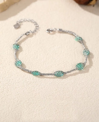 Zirkonia Armband aus 925 Sterlingsilber - flach auf heller Strukturfläche mit Verschluss und Verlängerungskette